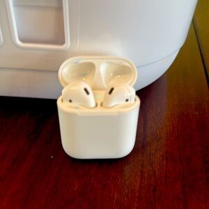 Apple AirPods with charging case and charger